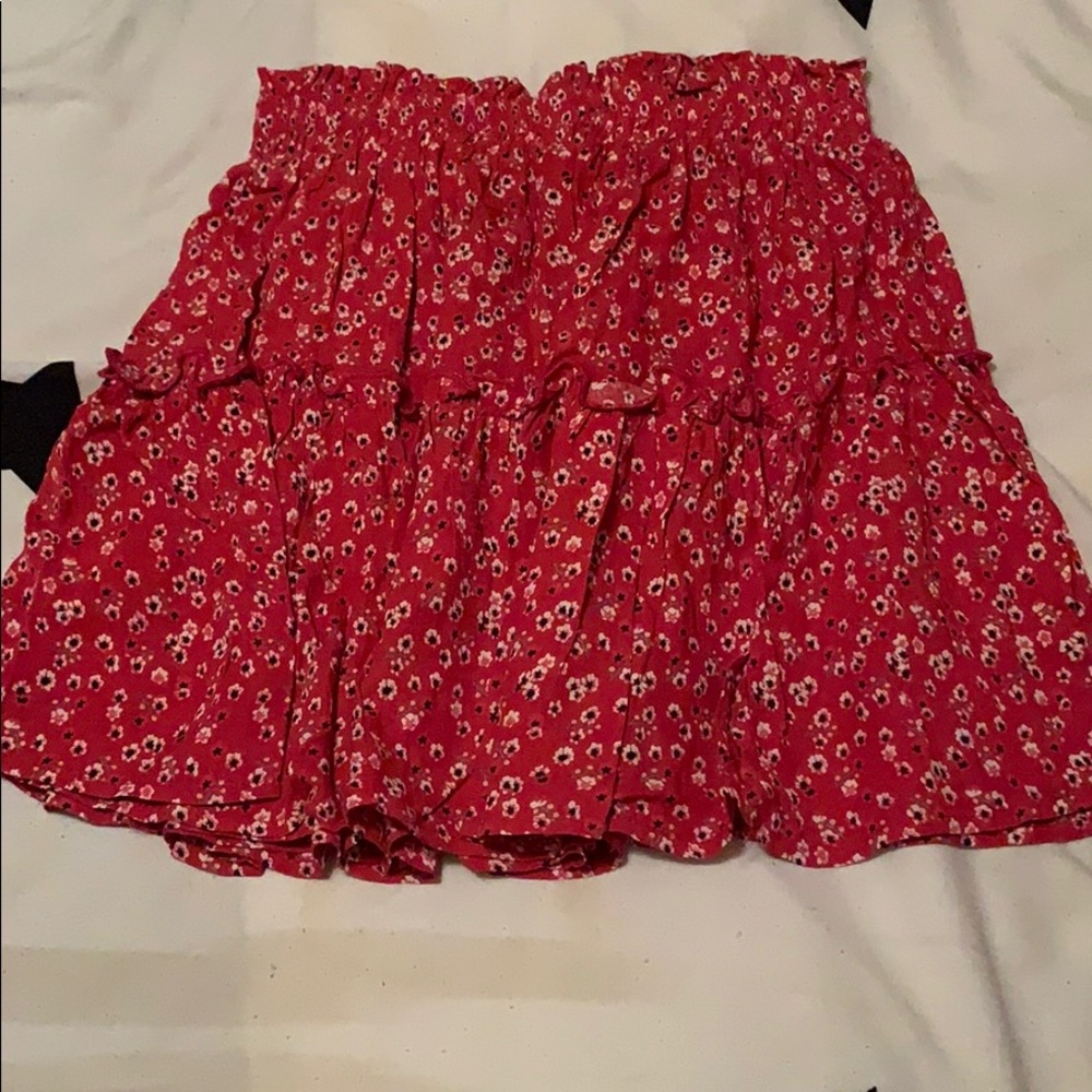 red ruffle skirt with white and black flowers